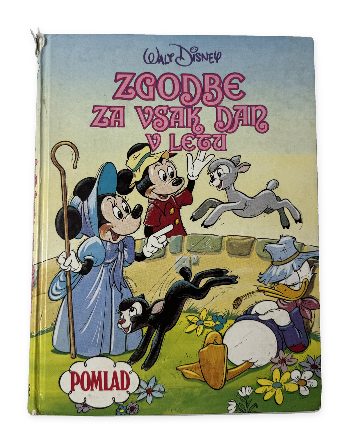 Zgodbe za vsak dan v letu – Pomlad: platnica z vidnim razcefranim vrhom hrbta