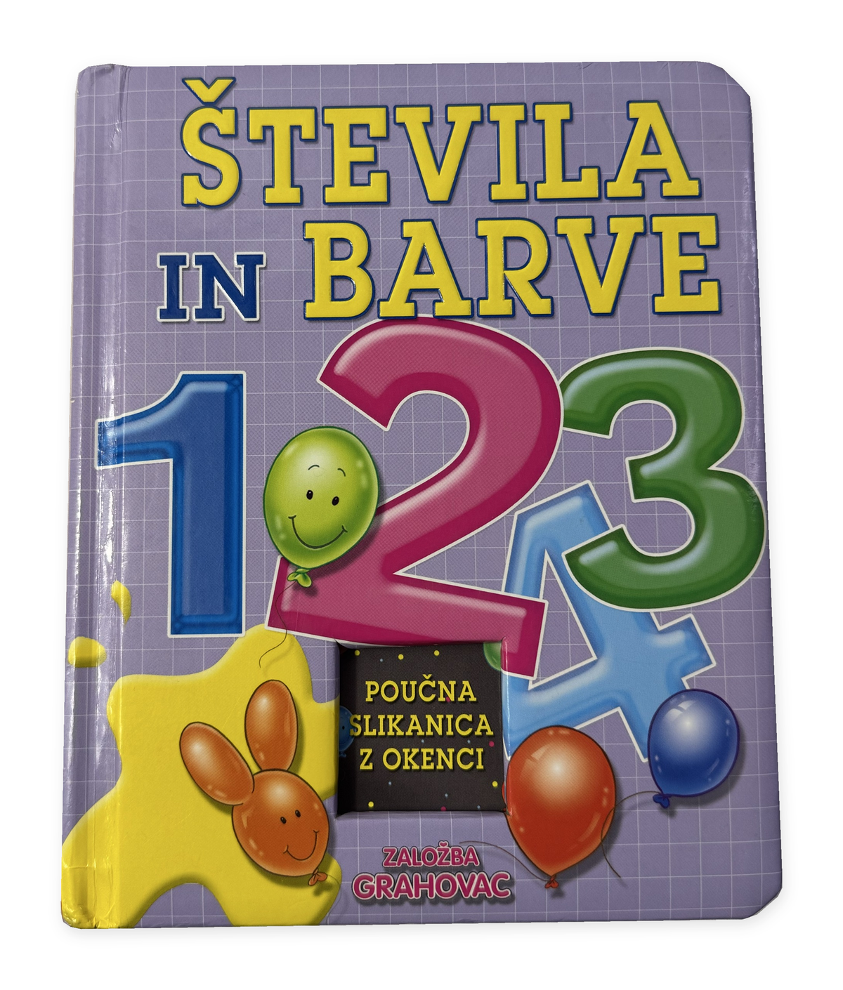 Števila in barve – izvirna platnica poučne slikanice z okenci, z vidno obrabo, na belem ozadju